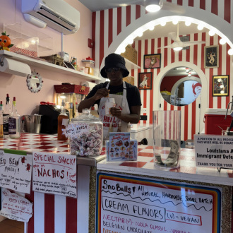 Serving up snowcones at Kitten N' Lou's Chance in Hell SnoBalls NOLA Bite into Bywater Tour